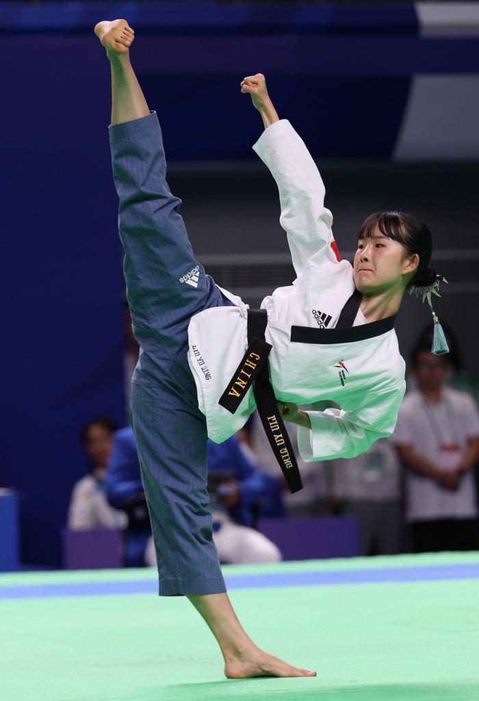爱体育官方网站-跆拳道比赛中,韩国选手夺得头筹